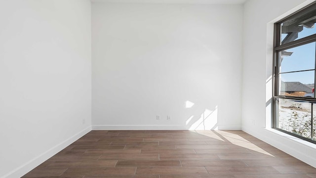 unfurnished room featuring a healthy amount of sunlight