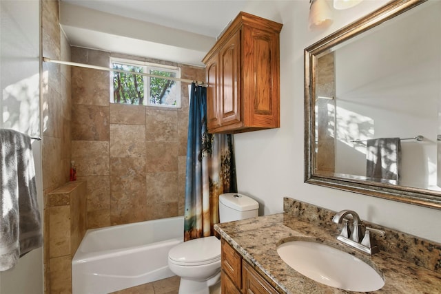 full bathroom featuring tile patterned flooring, shower / bath combination with curtain, vanity, and toilet