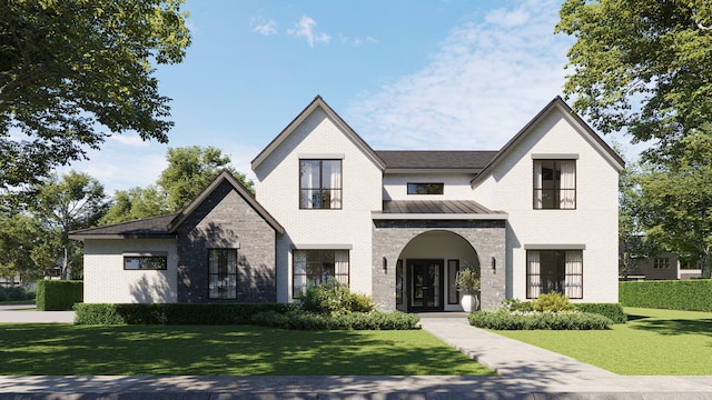 view of front facade featuring french doors and a front yard