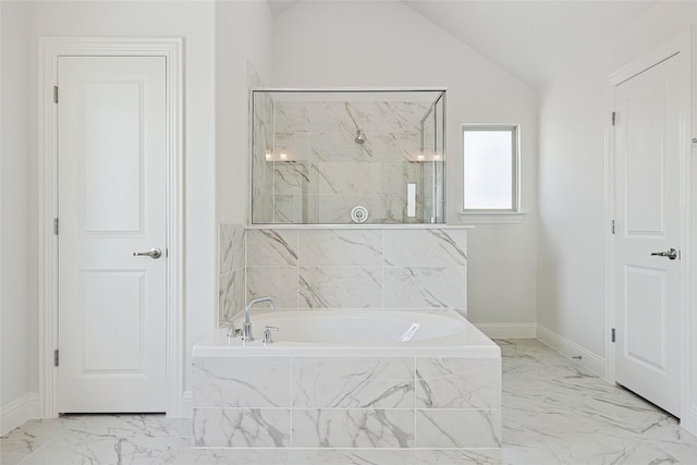 bathroom with independent shower and bath and vaulted ceiling