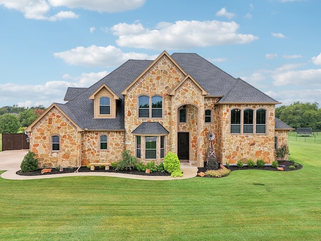 view of front of property with a front lawn