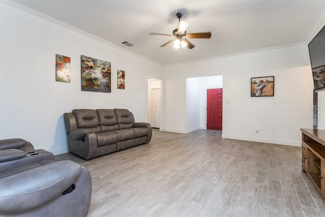 living room featuring ornamental molding, ceiling fan, and light hardwood / wood-style floors