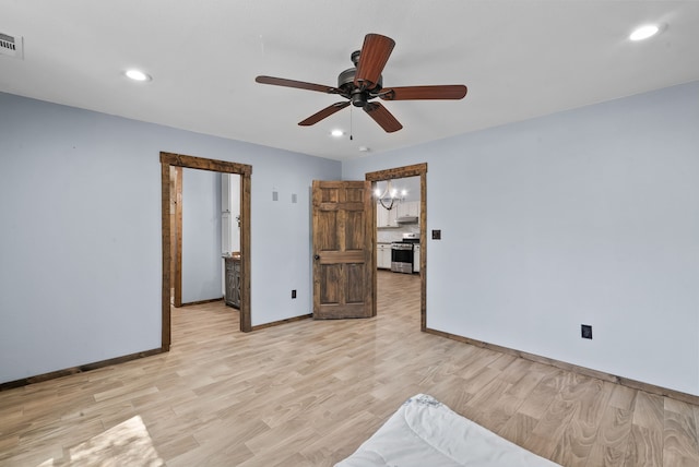 unfurnished bedroom with light hardwood / wood-style flooring and ceiling fan