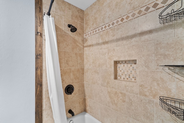 room details with shower / bathtub combination with curtain