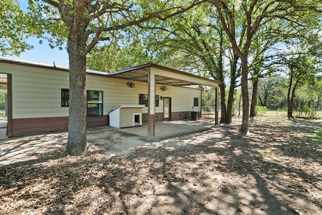 back of house featuring a patio area