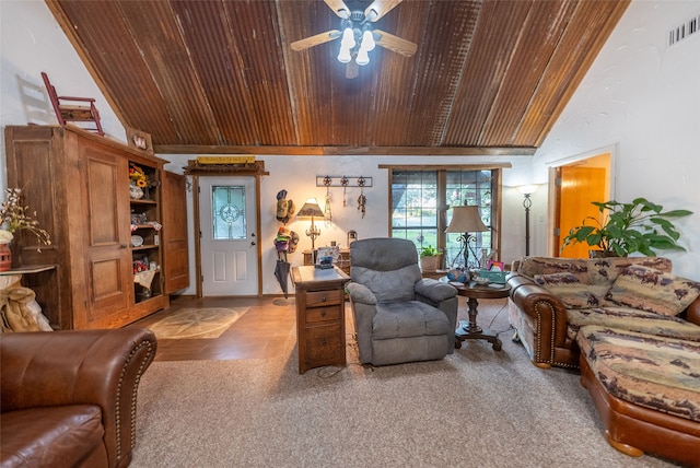 living room featuring lofted ceiling, carpet, ceiling fan, and wooden ceiling