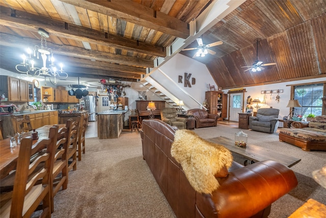 living room featuring ceiling fan with notable chandelier, light colored carpet, lofted ceiling with beams, and wooden ceiling