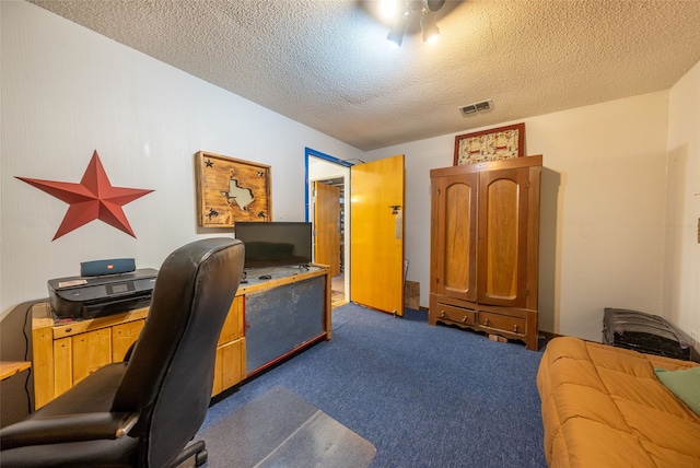 office space featuring dark colored carpet and a textured ceiling