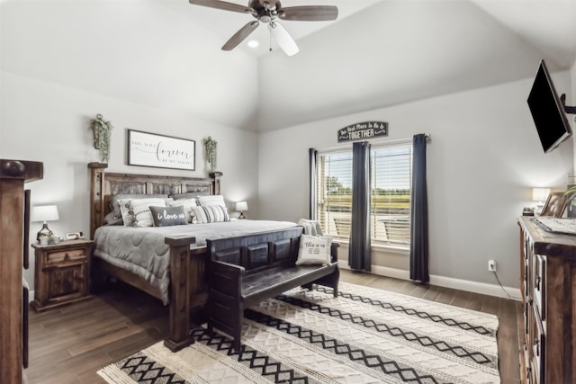 bedroom featuring lofted ceiling, ceiling fan, and dark wood-type flooring