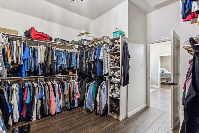 walk in closet featuring hardwood / wood-style floors