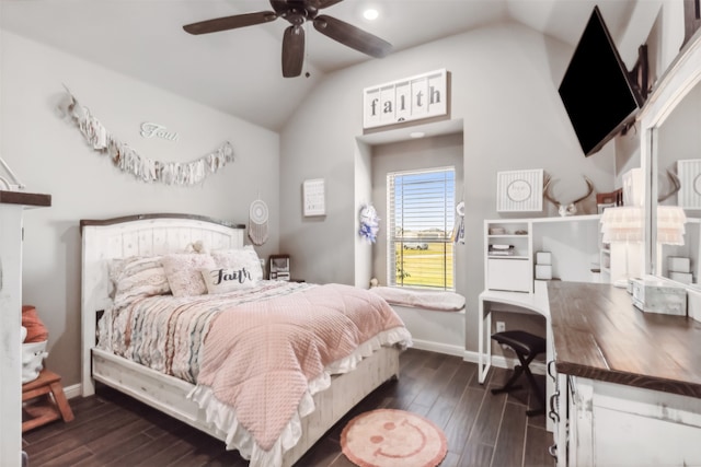 bedroom with ceiling fan, vaulted ceiling, and dark wood-type flooring