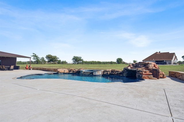 view of swimming pool with a lawn and a patio area