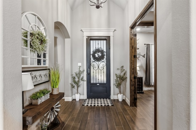 foyer entrance featuring dark hardwood / wood-style flooring