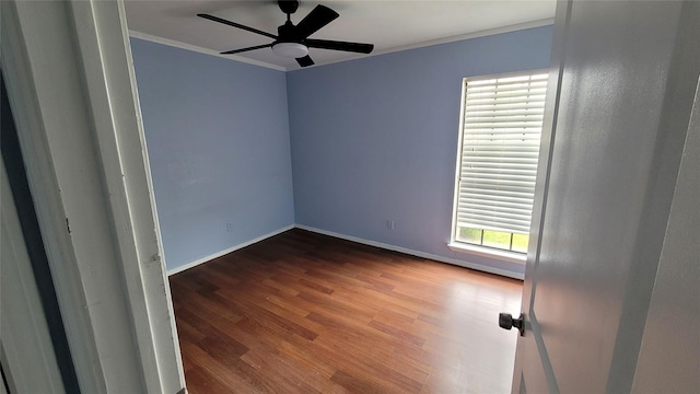 unfurnished room featuring crown molding, hardwood / wood-style flooring, and ceiling fan