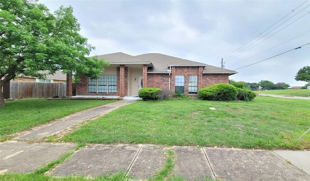 view of front facade with a front lawn