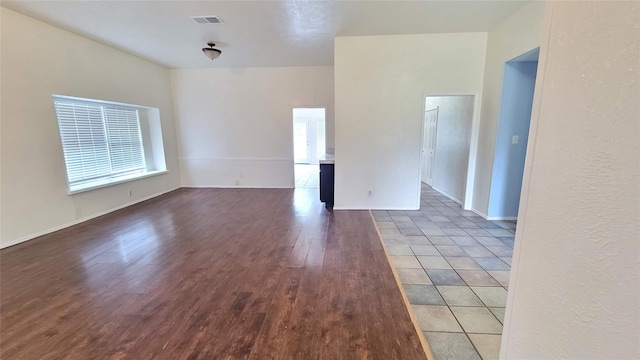 empty room with wood-type flooring