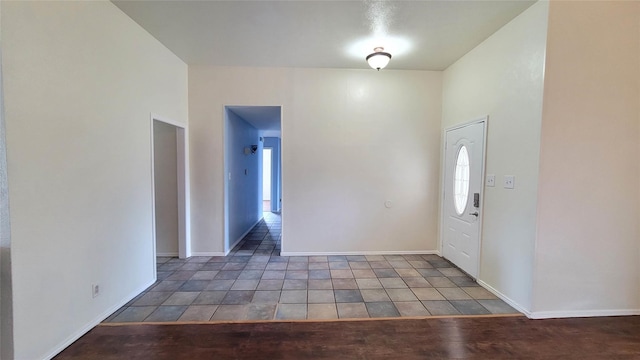 entryway featuring plenty of natural light and tile patterned floors