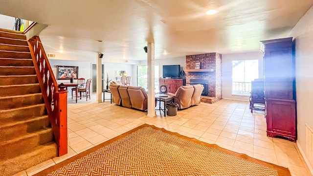 tiled living room with a fireplace