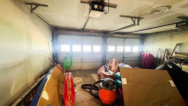 garage featuring a garage door opener