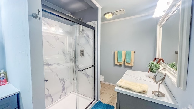 bathroom featuring crown molding, tile patterned floors, walk in shower, toilet, and vanity