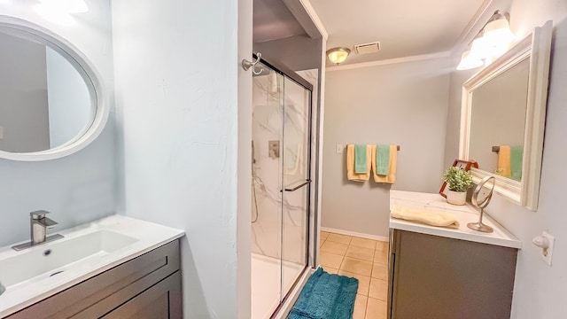 bathroom with vanity, ornamental molding, an enclosed shower, and tile patterned floors