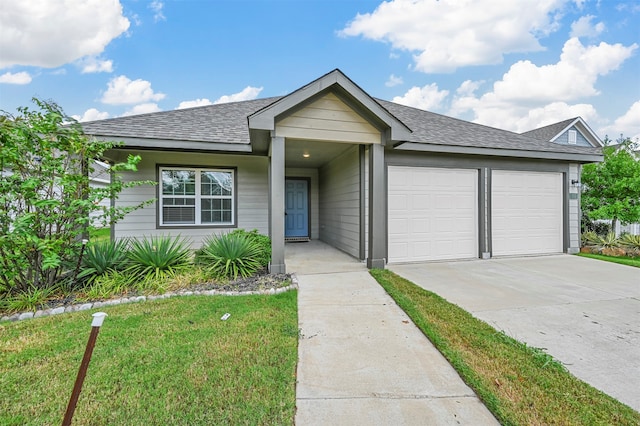 ranch-style house with a front yard and a garage