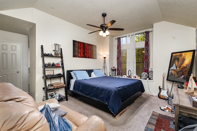 carpeted bedroom featuring a textured ceiling, ceiling fan, and vaulted ceiling