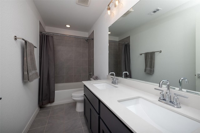 full bathroom with tile patterned flooring, vanity, shower / bath combination with curtain, and toilet