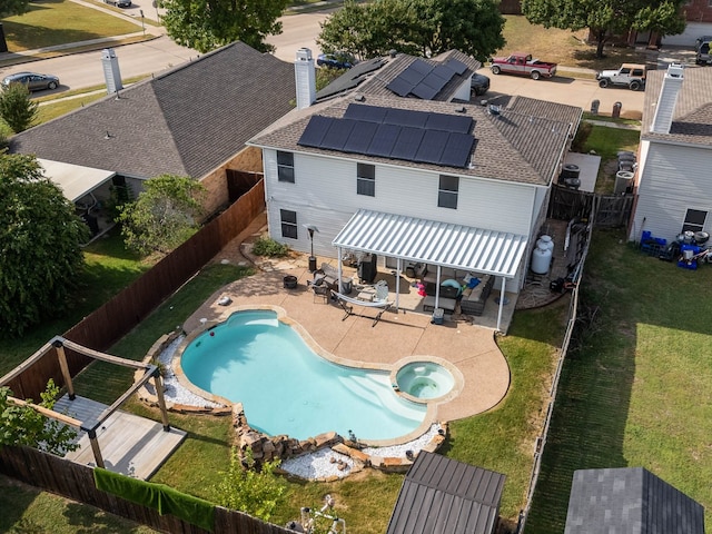 view of swimming pool with a lawn and a patio