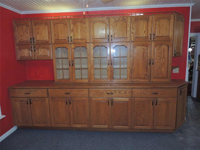 details featuring ornamental molding and wood ceiling