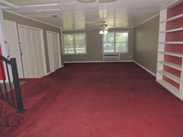 unfurnished living room with carpet, ceiling fan, crown molding, and a wall unit AC