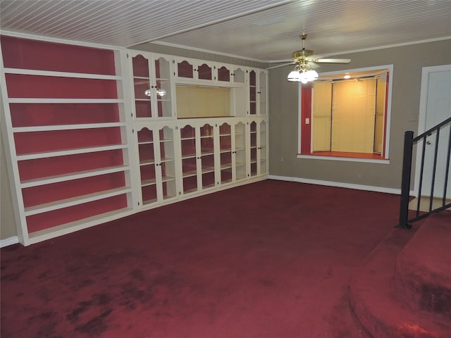 unfurnished living room featuring crown molding and carpet floors