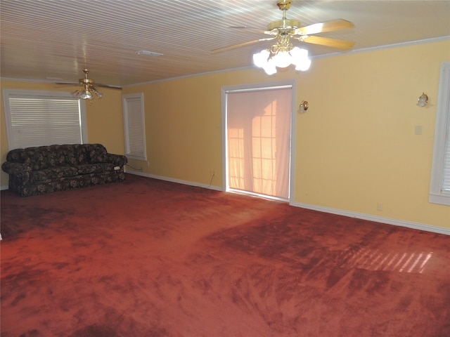 living room with carpet flooring, crown molding, and ceiling fan