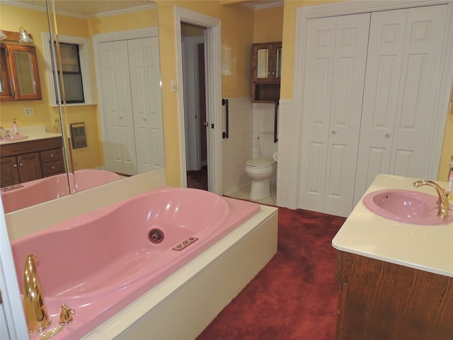 bathroom featuring vanity, toilet, and crown molding