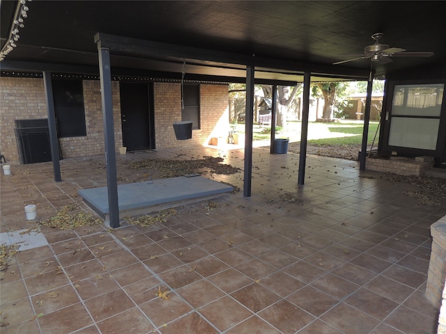 view of patio featuring ceiling fan