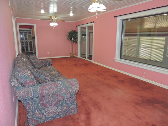 unfurnished room featuring carpet flooring, ceiling fan, and ornamental molding