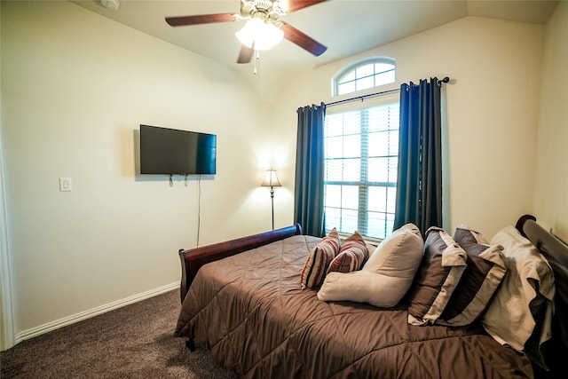 carpeted bedroom with lofted ceiling and ceiling fan