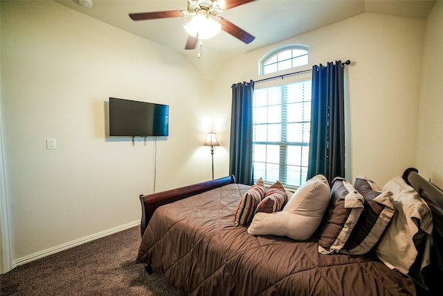 bedroom featuring baseboards, a ceiling fan, carpet, and vaulted ceiling