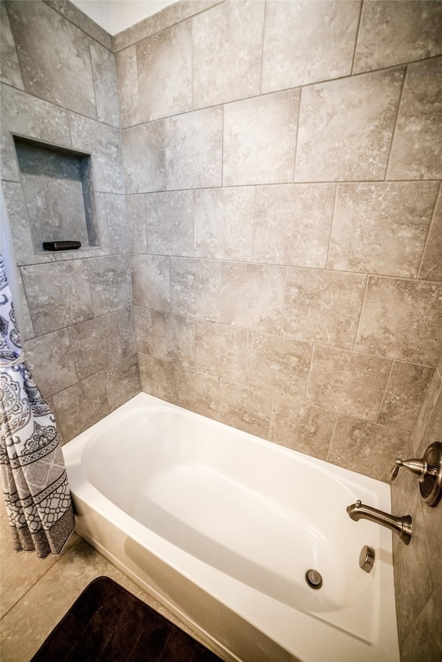 full bathroom featuring shower / bathtub combination with curtain