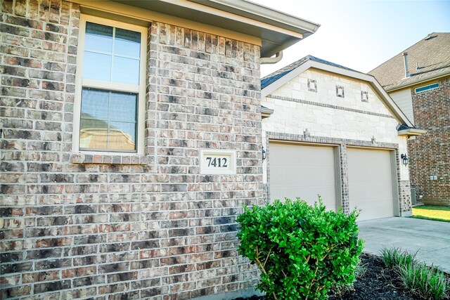 exterior space with a garage