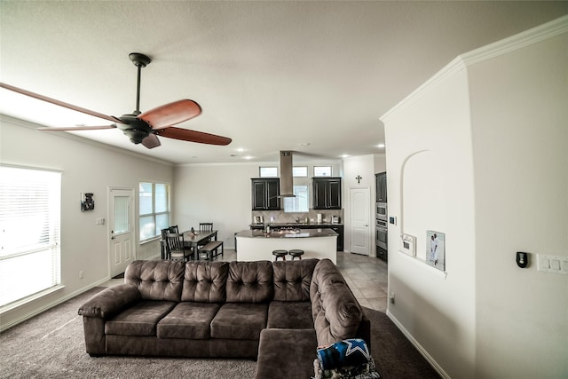 living room featuring recessed lighting, crown molding, light tile patterned floors, baseboards, and ceiling fan