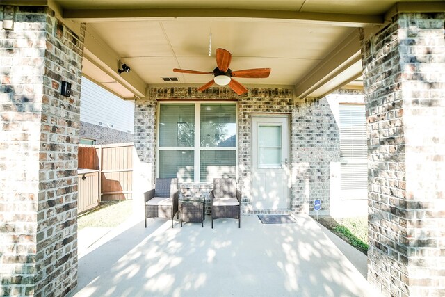 view of patio / terrace featuring ceiling fan