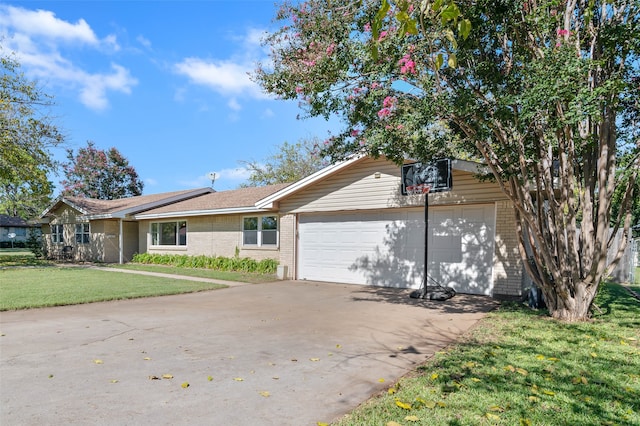 ranch-style house with a garage and a front yard