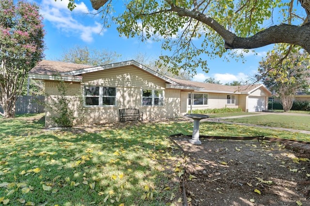 ranch-style home with a front yard