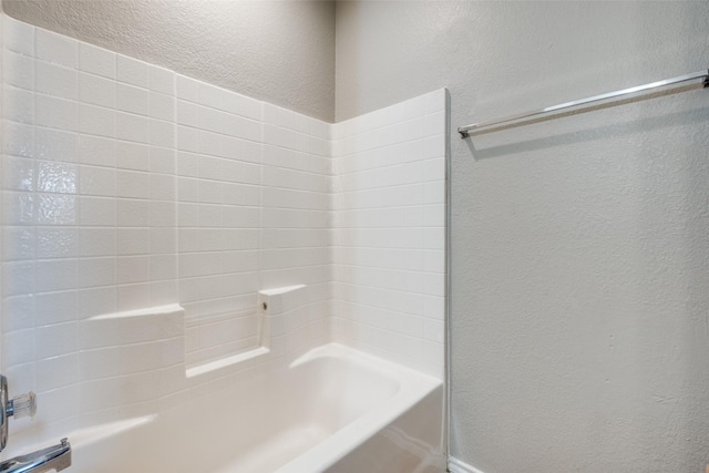 bathroom with shower / bathtub combination