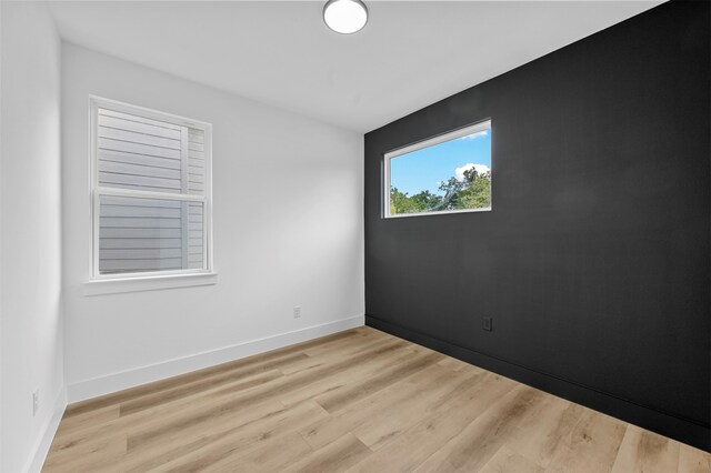 empty room featuring light hardwood / wood-style floors