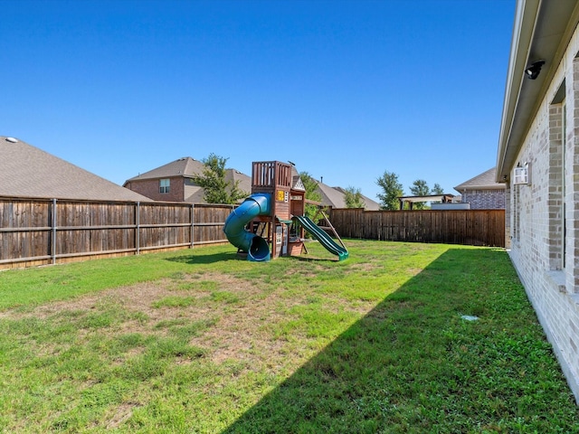 view of yard with a playground