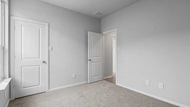 interior space with light colored carpet