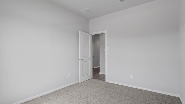 unfurnished room featuring carpet floors