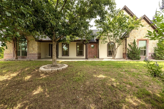 view of front of home with a front yard